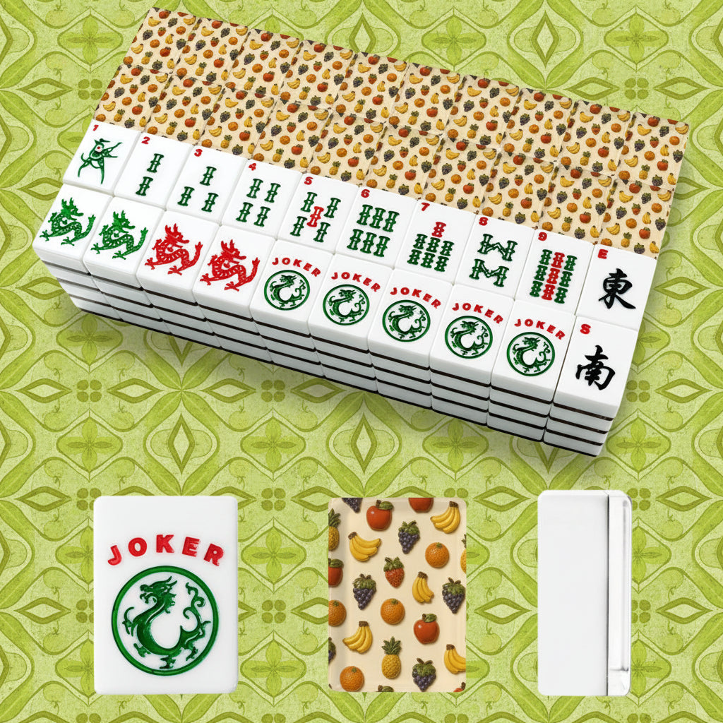 A set of Mahjong-style tiles shown on a plain white background, with a stack of tiles, a few individual tiles visible, and three smaller detail views below. The tiles are white with multicolored fruit and animal motifs, and the back of the tile set has a warm beige background with dense multicolored fruit print.